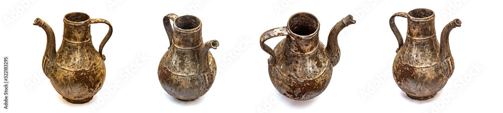 Beautiful vintage cast iron jug on white isolated background