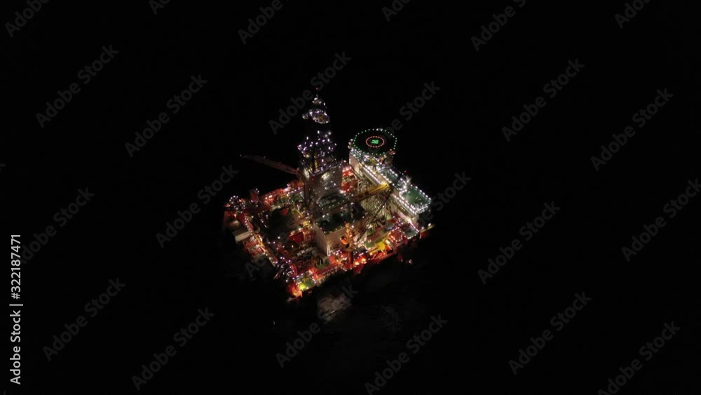oil rig lights up in the night oil rig lights up in the night
