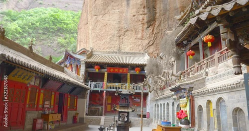 Chinese ancient traditional temple in Tianshui Wushan Water Curtain Caves, Gansu China photo