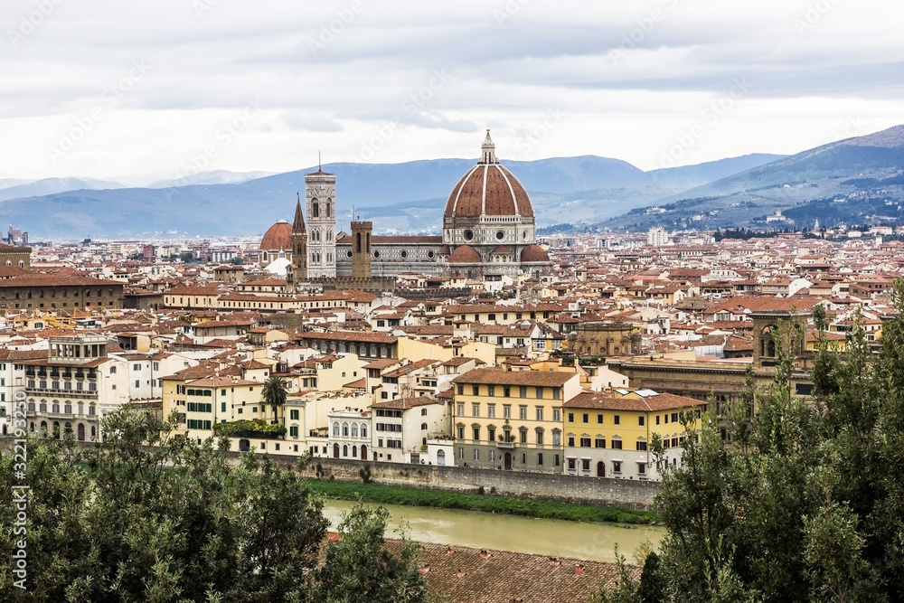 Florence winter cityscape. Low season in Italy. Old town duomo view point travel background.