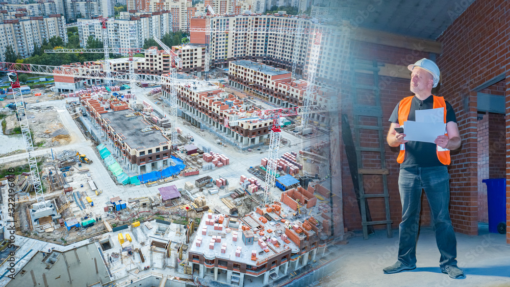 Fototapeta premium Construction. Man at a construction site. Constructing of a residential area view from above. Builder with documents inside a building under construction. Architect represents a constructing site