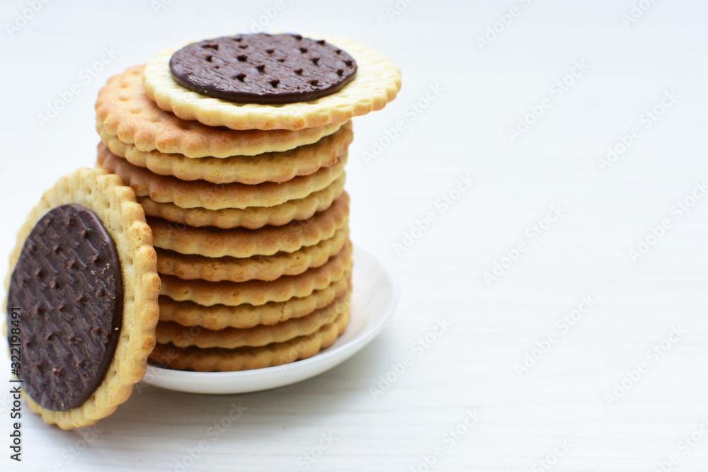 Chocolate cookies displayed on light background Chocolate cookies displayed on light background