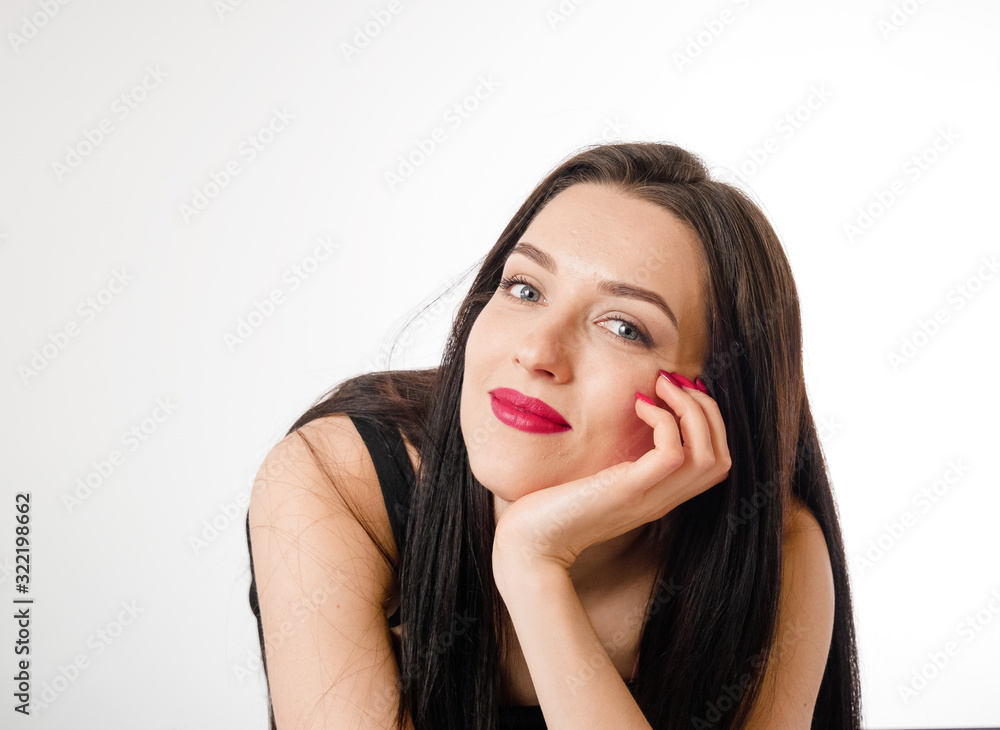 Business young beautiful lady on a white background shows different emotions copy space Business young beautiful lady on a white background shows different emotions copy space