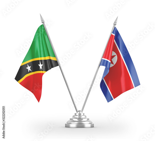 North Korea and Saint Kitts and Nevis table flags isolated on white 3D rendering photo