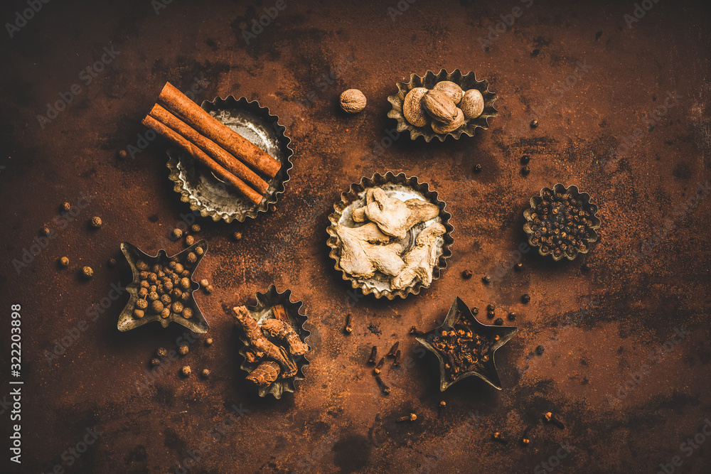 Turkish seven spice Yedi Bahar mix. Flatlay of black pepper, ginger