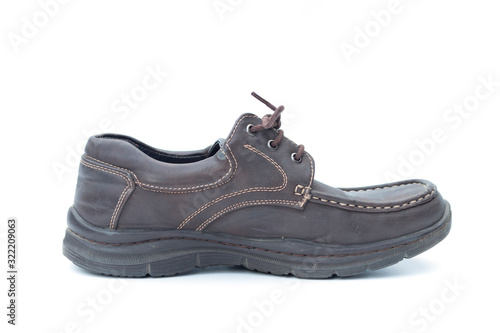 Brown old shoes on a white background