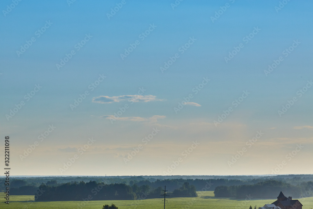 Fototapeta premium Blue aerial landscape on light background. Empty background scene. Panoramic view. Sky blue background. Urban scene. Sunny day, blue sky. Wide angle. Wide panorama. Aerial view. Sky clouds.