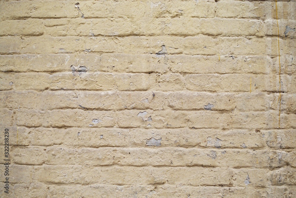 Obraz premium Yellow brick wall