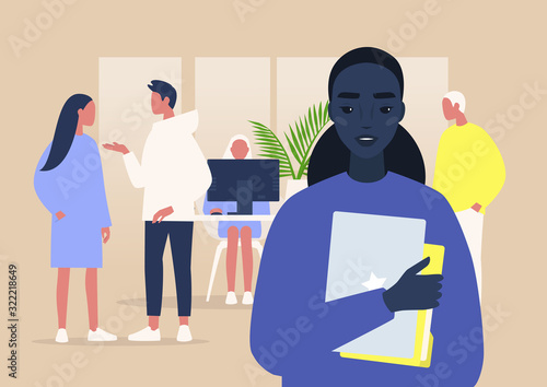 A portrait of a young black female manager holding a laptop and folders, a group of coworkers on background, daily office life