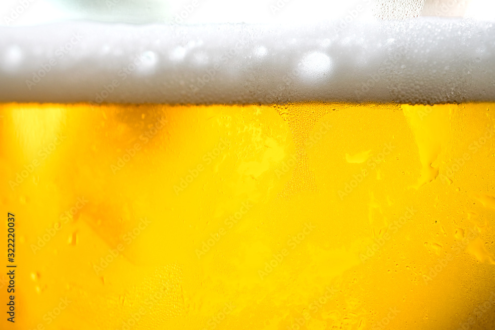 Background Cool beers with beer bubbles on top a glass at the party Background Cool beers with beer bubbles on top a glass at the party