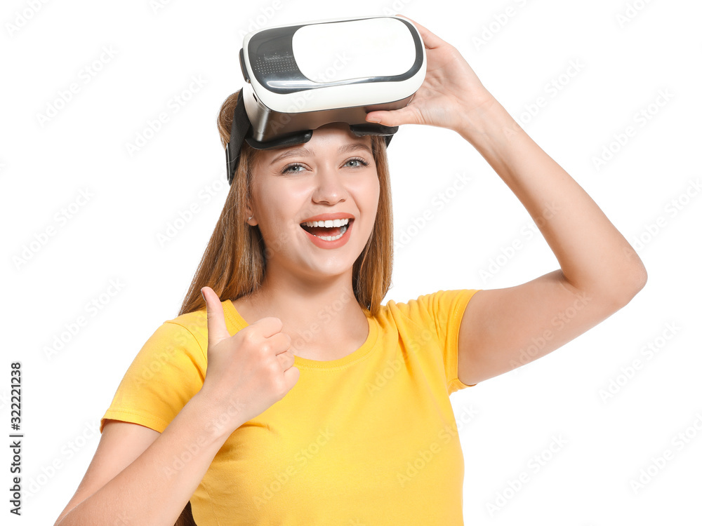 Young woman with VR glasses on white background Young woman with VR glasses on white background