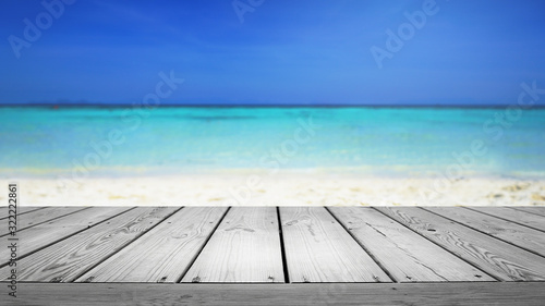 Blurred nature summer tropical beach background and empty wooden. 
