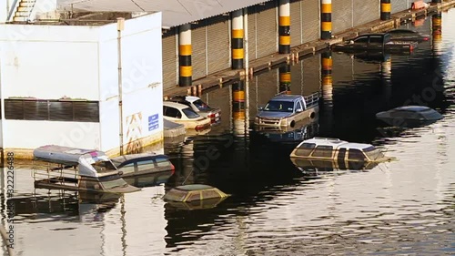 Cars swamped by Flood water, Thai flood hits Central of Thailand, Severe flooding occurred during the 2011 monsoon season in Thailand