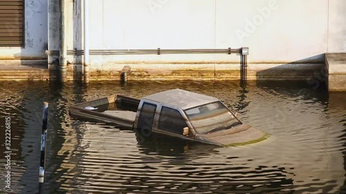 Cars swamped by Flood water, Thai flood hits Central of Thailand, Severe flooding occurred during the 2011 monsoon season in Thailand