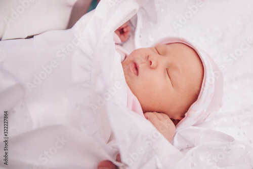 close up. cute newborn baby wrapped in blanket