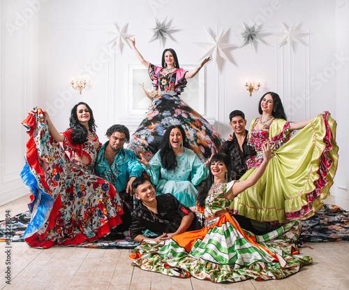team of folk Gypsy dance posing in front of the camera