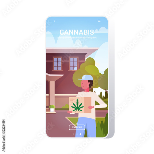 courier holding box with medical marijuana cannabis delivery service drug consumption concept smartphone screen mobile app copy space portrait vector illustration