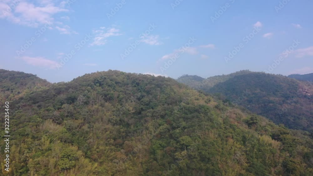 Aerial view of mountain against foggy sky Aerial view of mountain against foggy sky