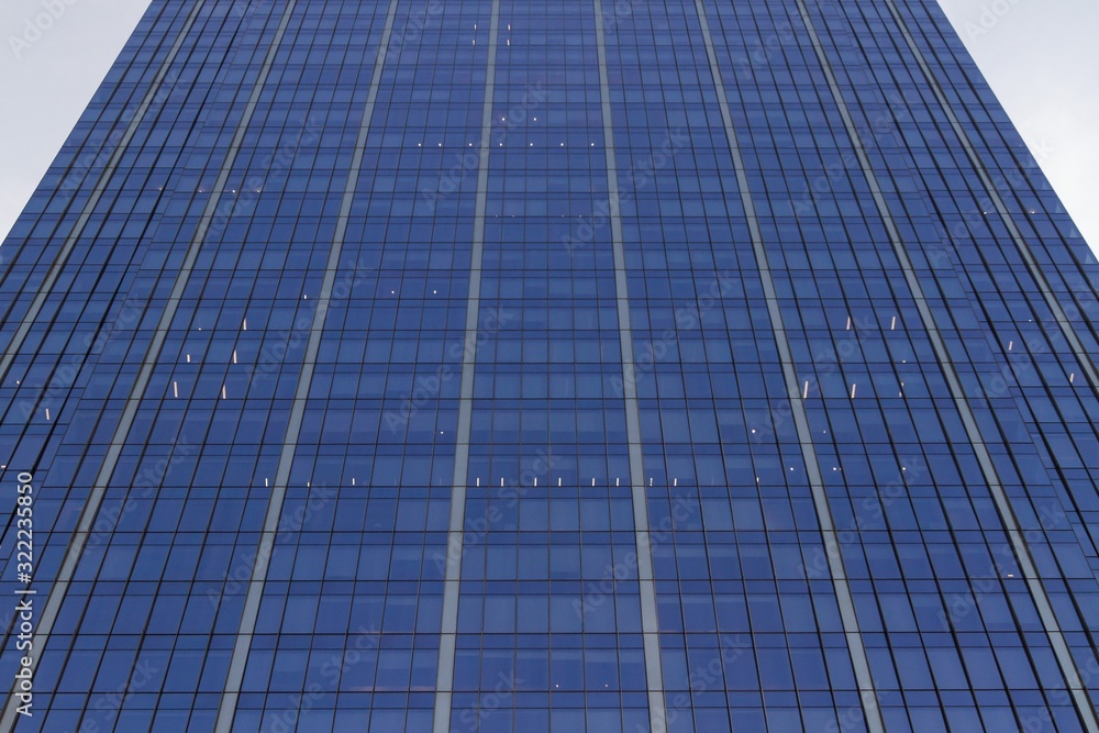 Glass wall of an office building, bottom view