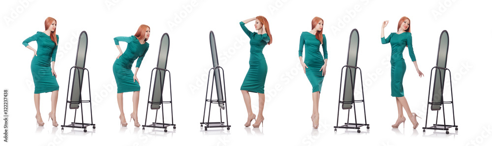 Woman trying new clothing on white Woman trying new clothing on white