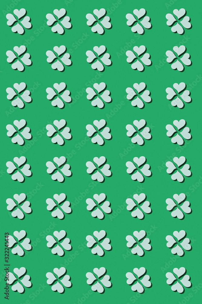 Holiday pattern from shamrock's leaves plants.