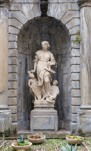 Bergamo, Italy. Statua dell'Architettura opera sculptor Giovanni Antonio Sanz (1702 - 1771 c.). The historical part of the city. Upper city. Rainy weather photo