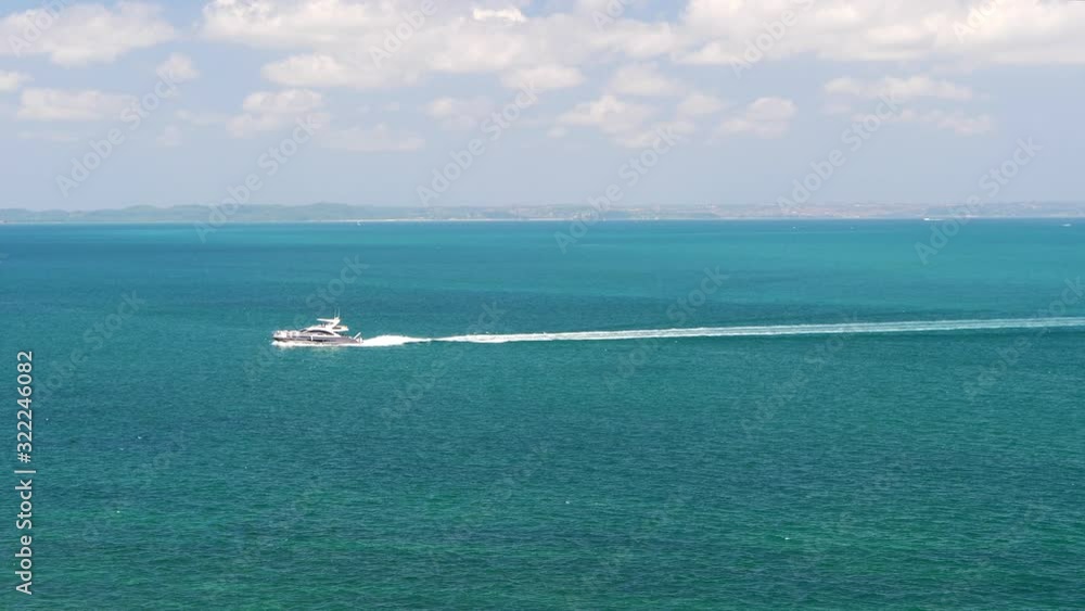 Yatch sliding in a beautiful blue ocean water, in front of Salvador, Bahia, Brazil. Yatch sliding in a beautiful blue ocean water, in front of Salvador, Bahia, Brazil.