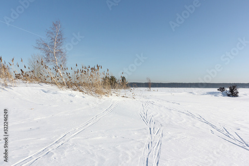 Fototapeta Naklejka Na Ścianę i Meble -  Snowy Island Hrenoviy, Ob Reservoir, Novosibirsk, Russia