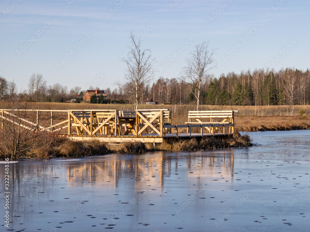 winter landscape with wooden pedestrian platform