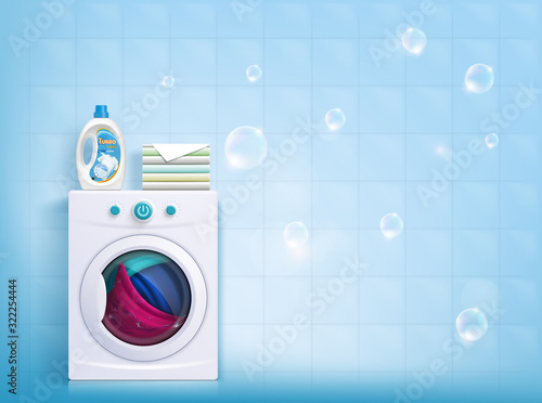 Bottle of liquid washing powder on the washing machine.