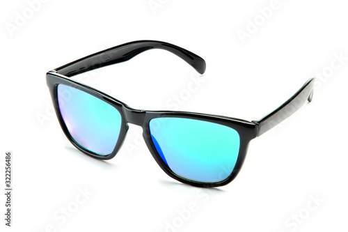 Classic black sunglasses with blue green lenses isolated on white background