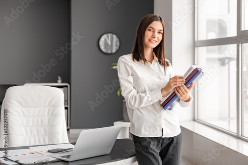 Portrait of young female ac...