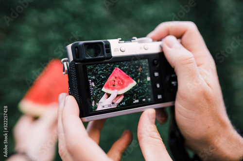 Taking a photo of a watermelon slice photo