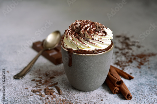 Fotografia Homemade delicious spicy hot chocolate with whipped cream.