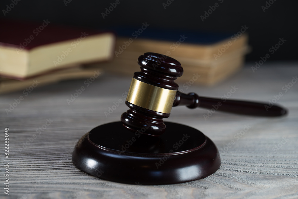 Law and Justice symbols over black background Law and Justice symbols over black background