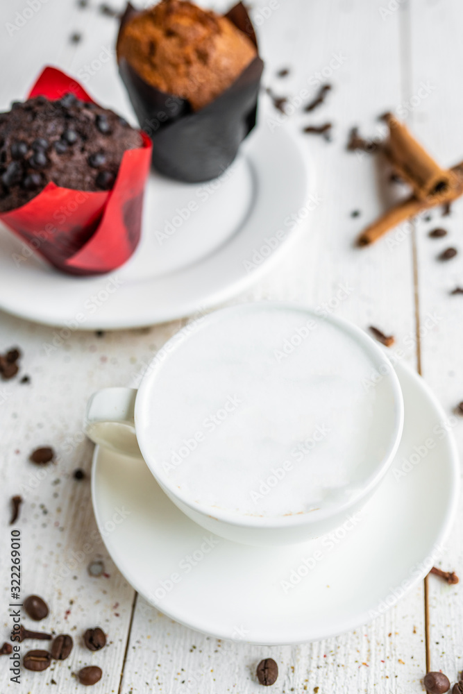 cup of cappuccino with a froth of milk. breakfast with coffee cup of cappuccino with a froth of milk. breakfast with coffee