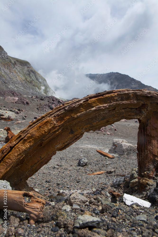 Whakaari White Island. Volcano. New Zealand. Taupo Volcanic Zone. Remnants of Sulpher mining. Abandoned rusty wheels