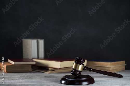 Law and Justice symbols over black background