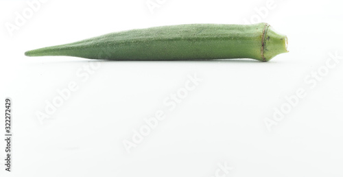 Raw fresh green Okra, Lady's finger, Gombo, Gumbo, Bendee, Quimbamto,Bhindi,Bamies  isolate on white background.Organic food. photo