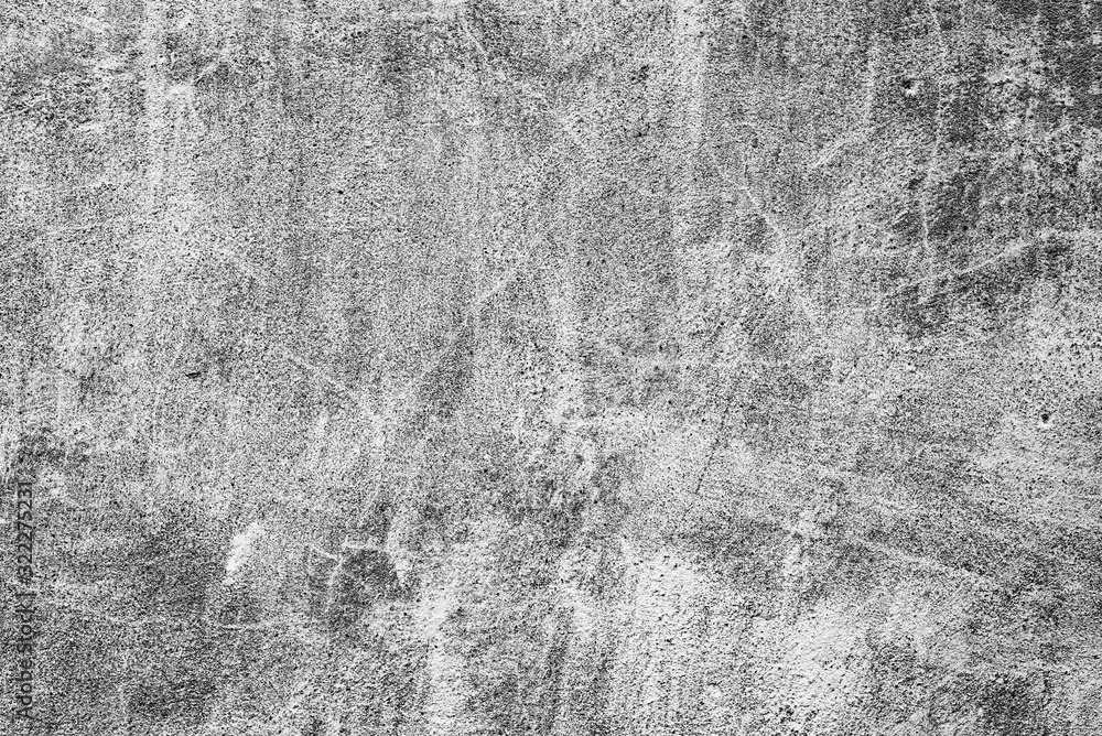 Obraz premium Texture of a concrete wall with cracks and scratches which can be used as a background