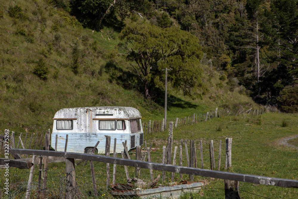 Abandoned caravan in countryside. New Zealand. Decay