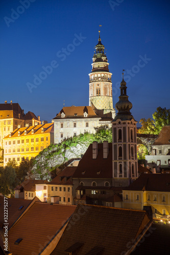 Beautiful portrait view to church and castle in Cesky Krumlov at night, Czech republic