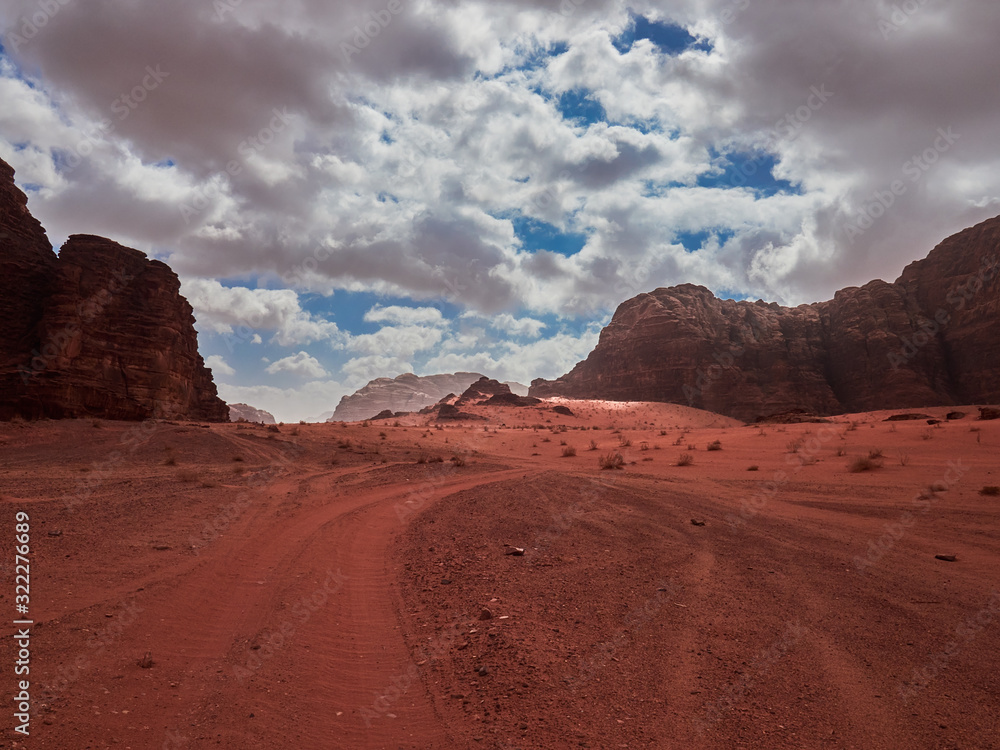 Beautiful Scenery Scenic Panoramic View Red Sand Desert and Ancient Sandstone Mountains Landscape in Wadi Rum, Jordan
