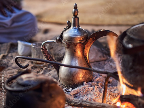 Traditional Bedouin coffee with spices on fire