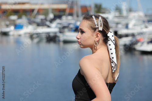 Beautiful young brunette woman in dress