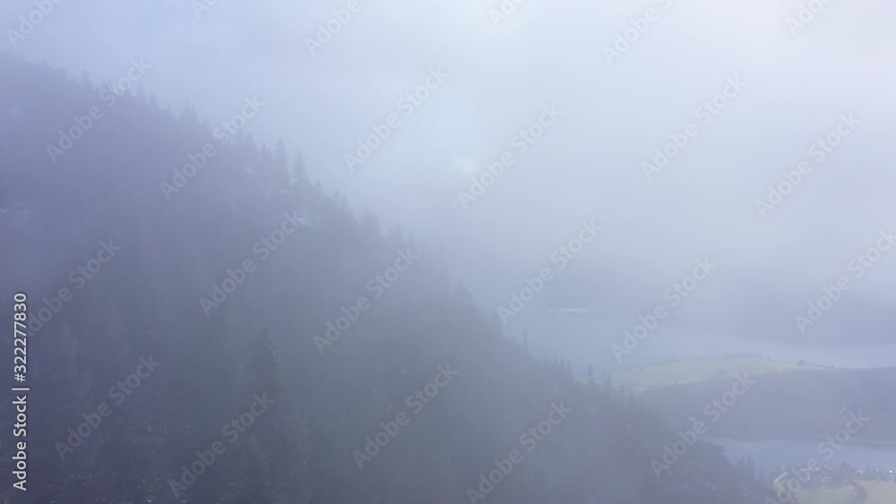 4K Flying through the clouds with drone in alps mountains. For cloud-transitions. 4K Flying through the clouds with drone in alps mountains. For cloud-transitions.