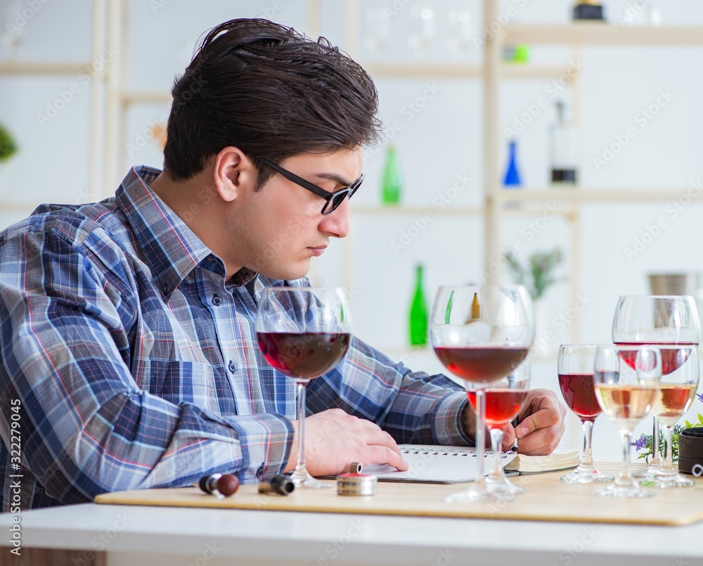 Professional sommelier tasting red wine Professional sommelier tasting red wine