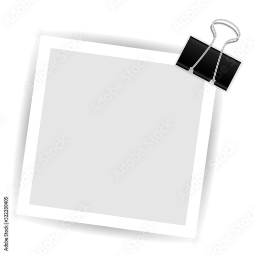 Photo with black paperclip isolated on white background.
