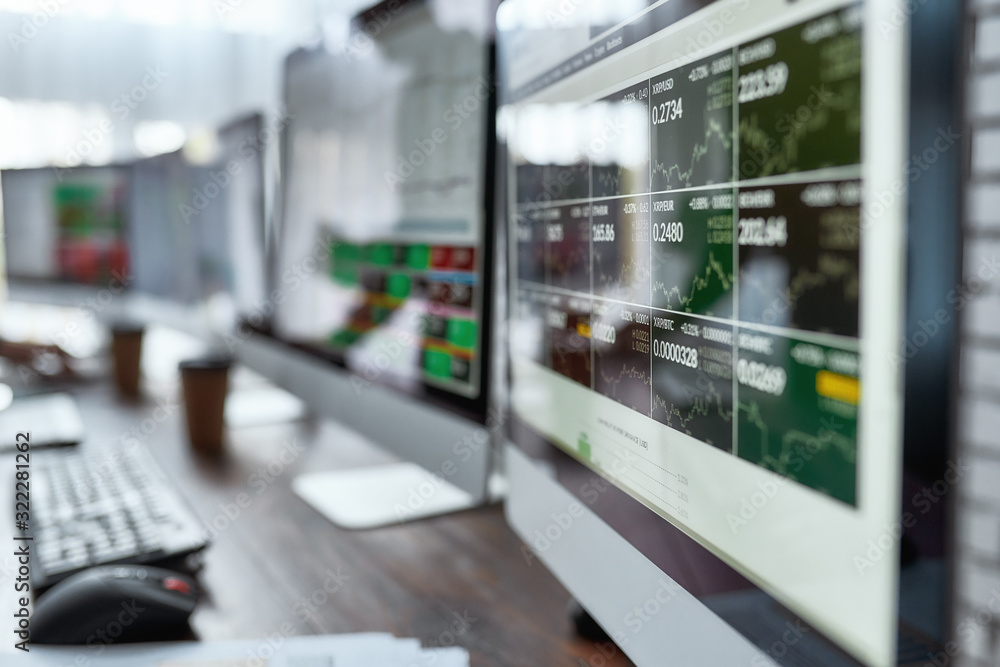 Purchase today for secured tomorrow. Multiple monitors with financial graphs and statistics on the table. Analysis of digital market and investment. Stock trade. Purchase today for secured tomorrow. Multiple monitors with financial graphs and statistics on the table. Analysis of digital market and investment. Stock trade.