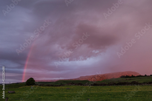 Tongariro National Park New Zealand. Rainbow. Sunset sky